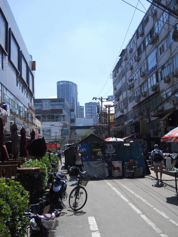 This street connects the swish zones and is littered with bars and shops
